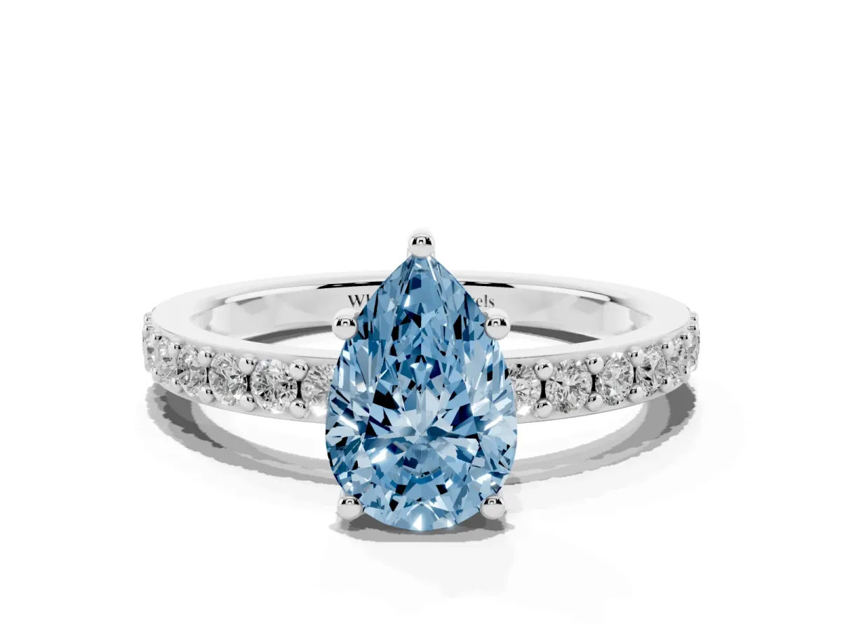 Fancy Blue Pear Cut Cut Diamond Solitaire with Pave Band and Four-Prong Setting Silver