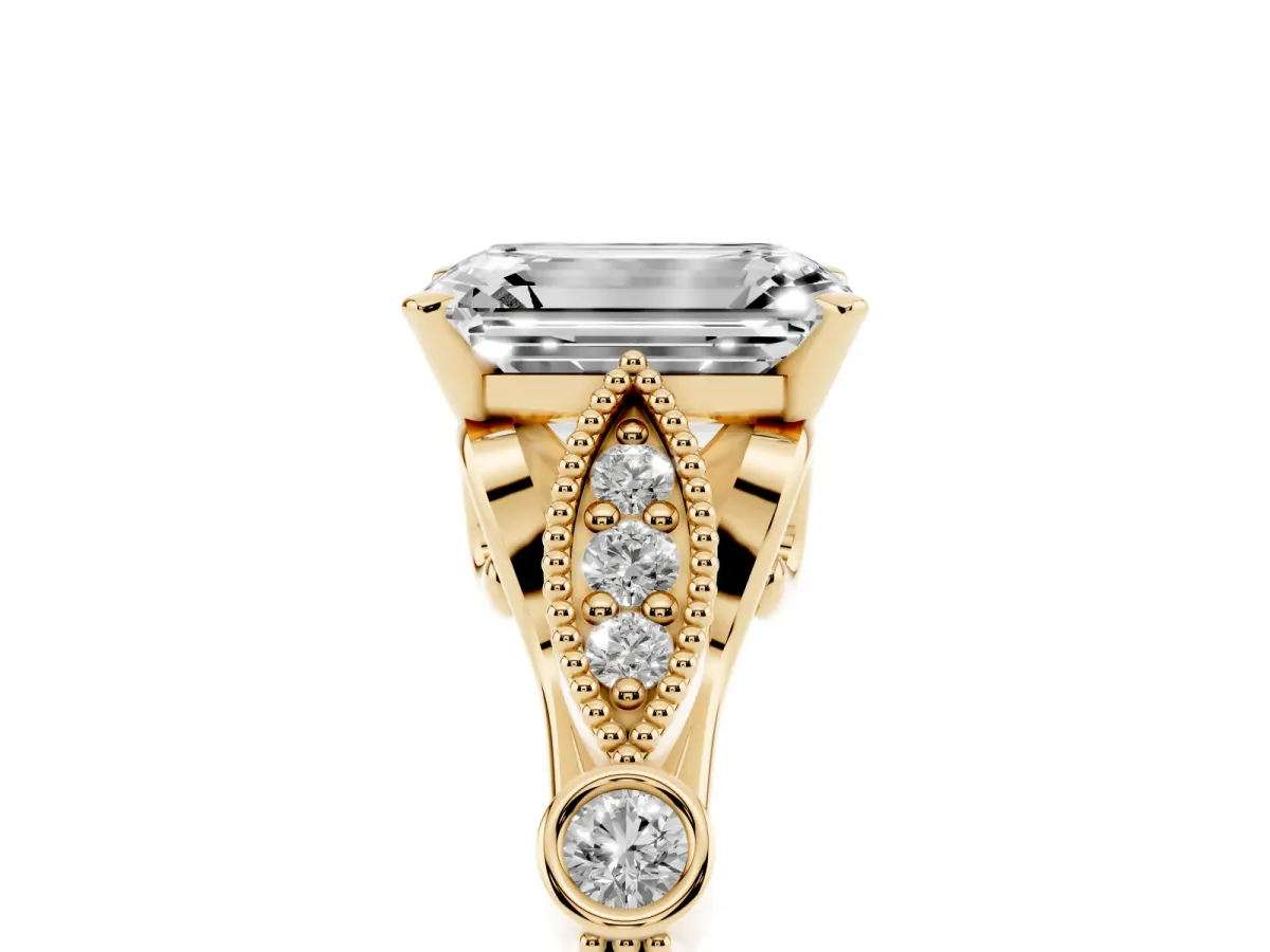 Emerald Cut Cut Diamond with Milgrain Marquise and Bezel Accents on a Solitaire Band with Prong Setting Yellow gold