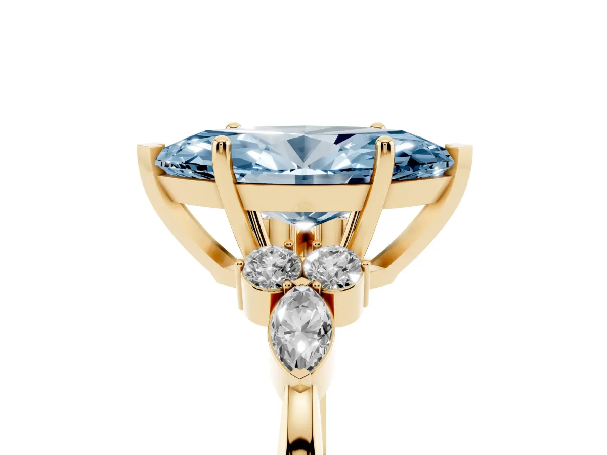 Fancy Blue Marquise Cut Brilliant Diamond Solitaire Ring with Pear Side Stones and Four-Prong Setting Yellow gold