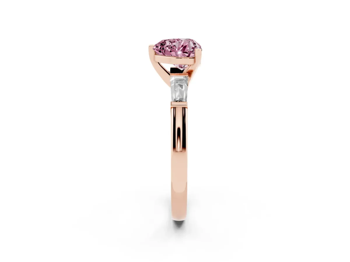 Fancy Pink Heart Cut Solitaire with Tapered Baguette Side Stones on a Classic Band with Four-Prong Setting Rose gold