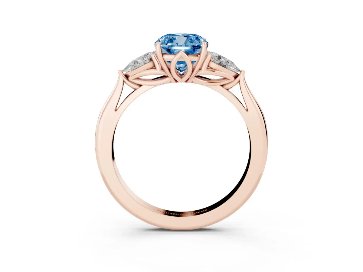 Fancy Blue Cushion Cut Diamond Three-Stone Ring with Pear Side Stones and Prong Setting Rose gold