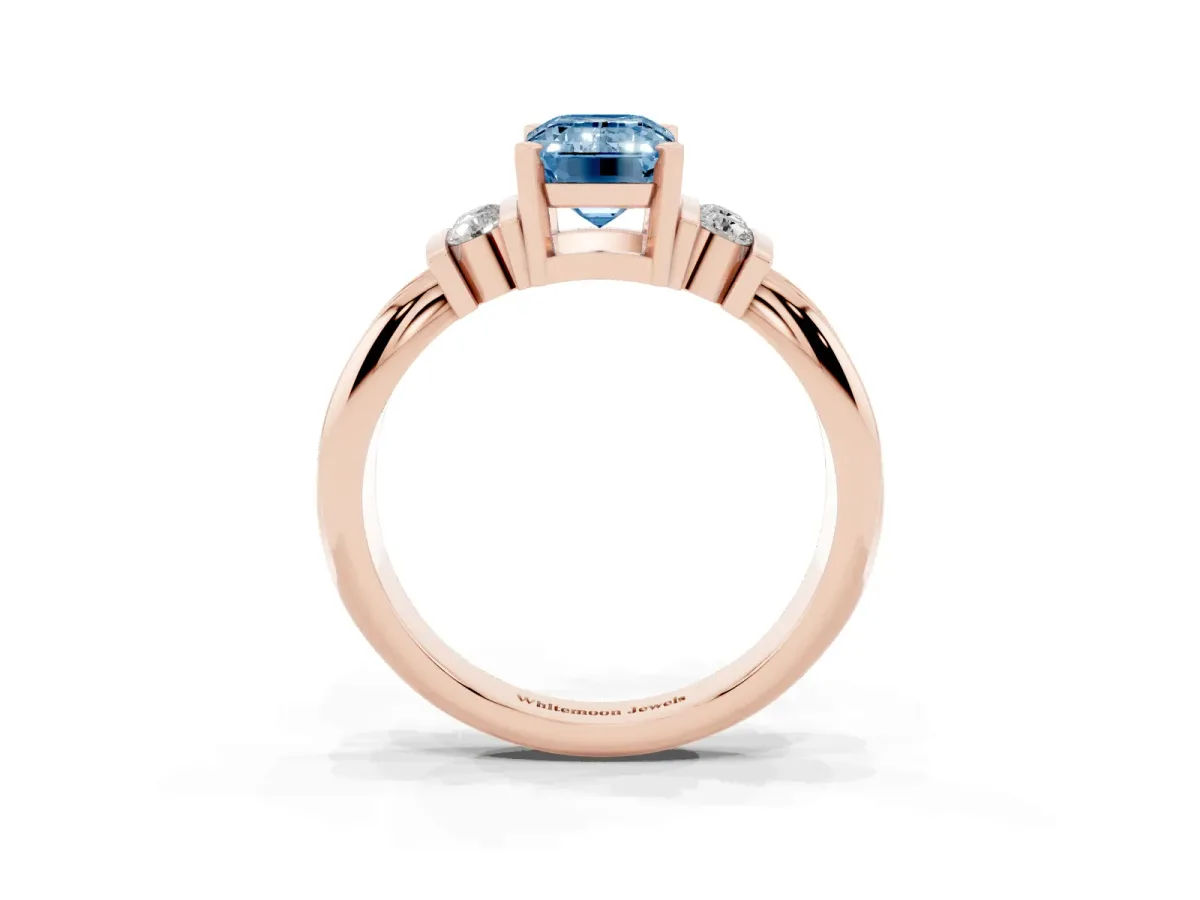 Fancy Blue Emerald Cut Cut Three-Stone Channel Set Ring with Bar Prongs Rose gold