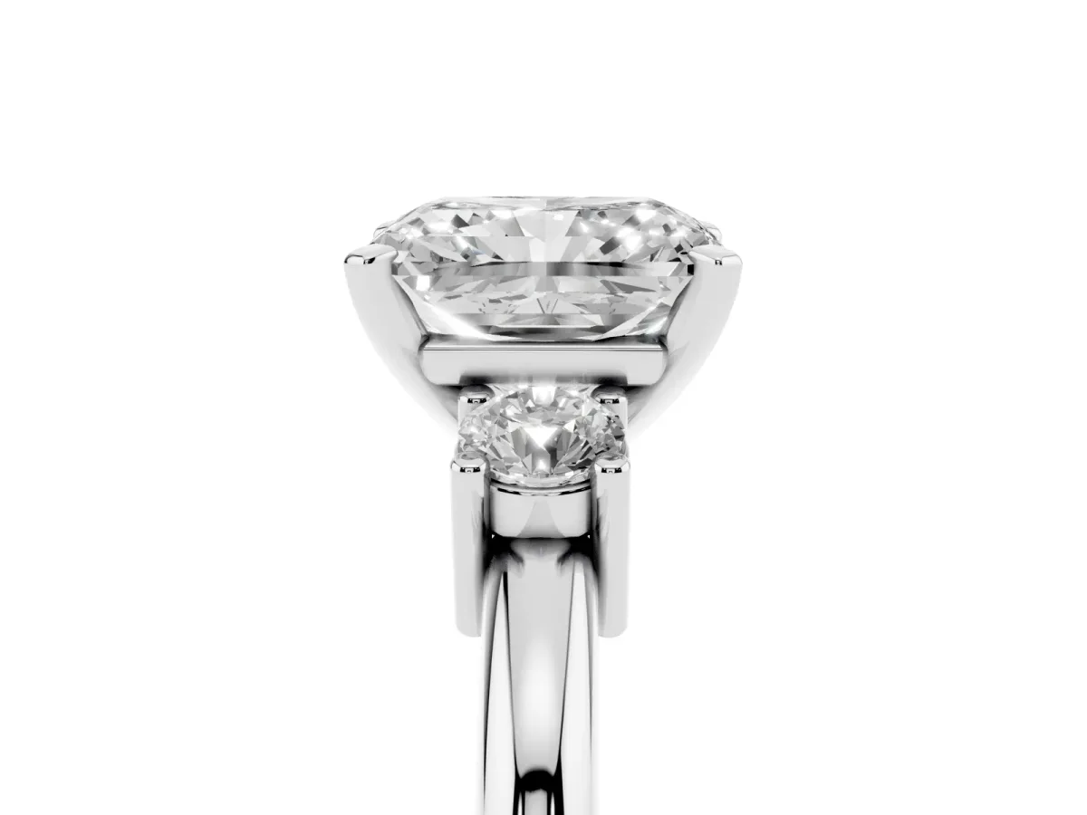 Three-Stone Radiant Cut Cut Diamond Solitaire with Prong Setting and Classic Band Silver