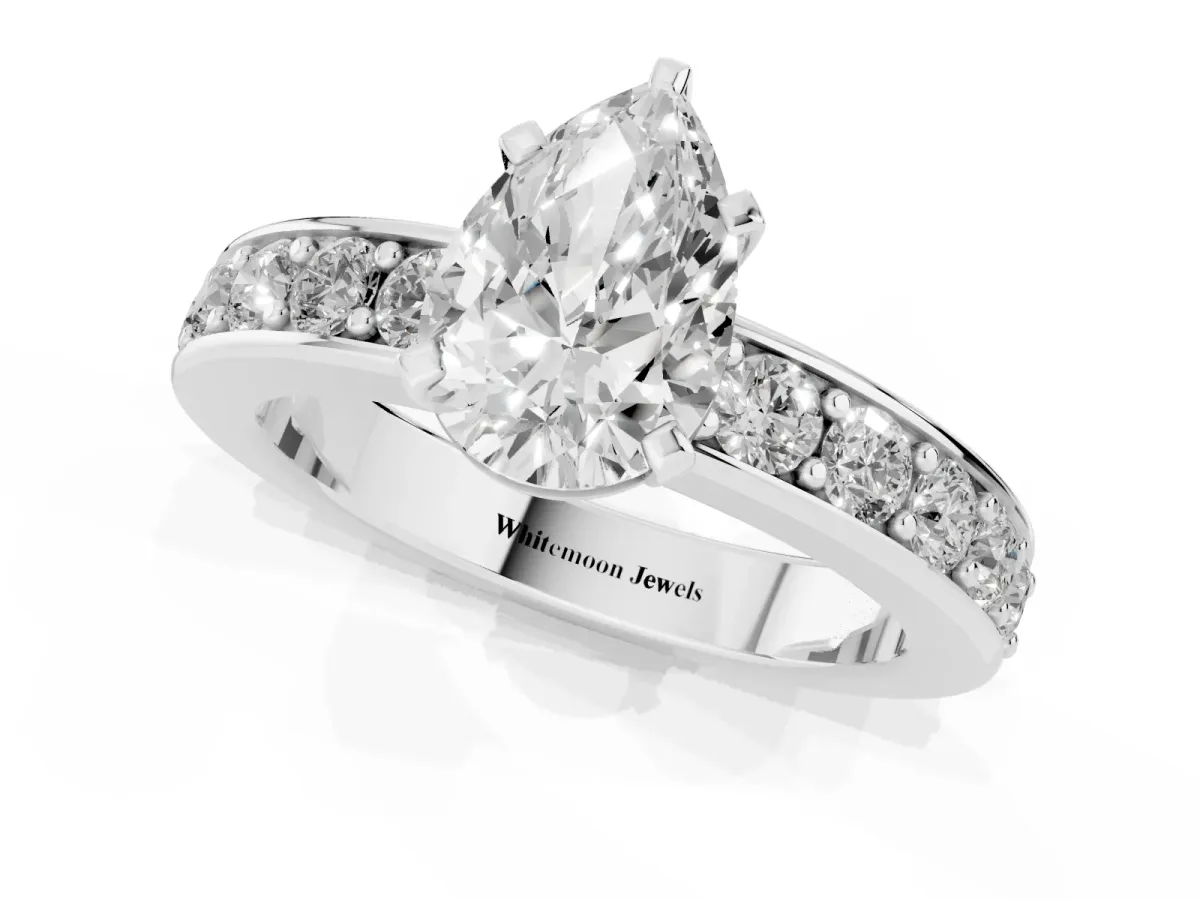 Pear Cut Diamond Engagement Ring with Channel Set Round Band and Prong Setting Silver