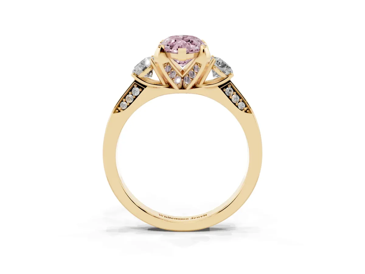 Fancy Pink Marquise Cut Brilliant Three-Stone Diamond Ring with Pavé Band and Four-Prong Setting Yellow gold