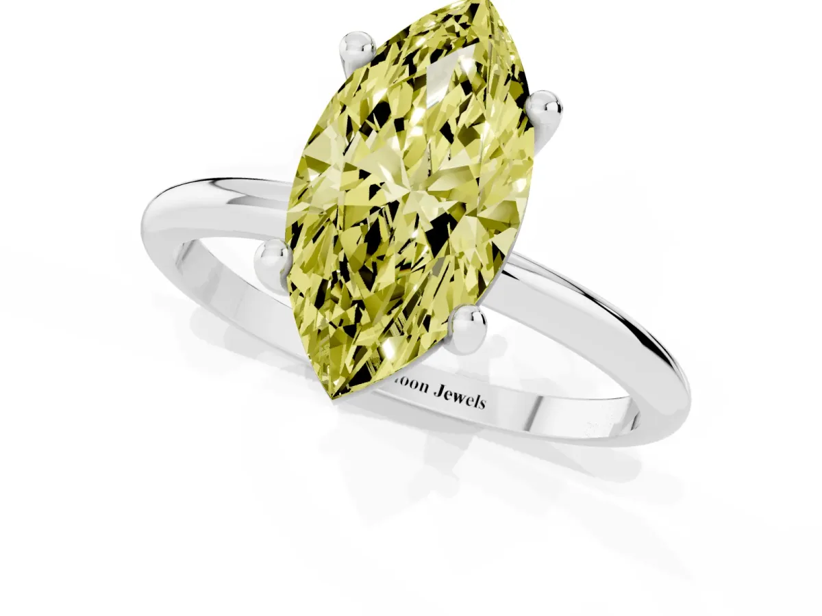 Fancy Yellow Marquise Cut Solitaire Diamond Ring with 4-Prong Setting on a Classic Band Silver
