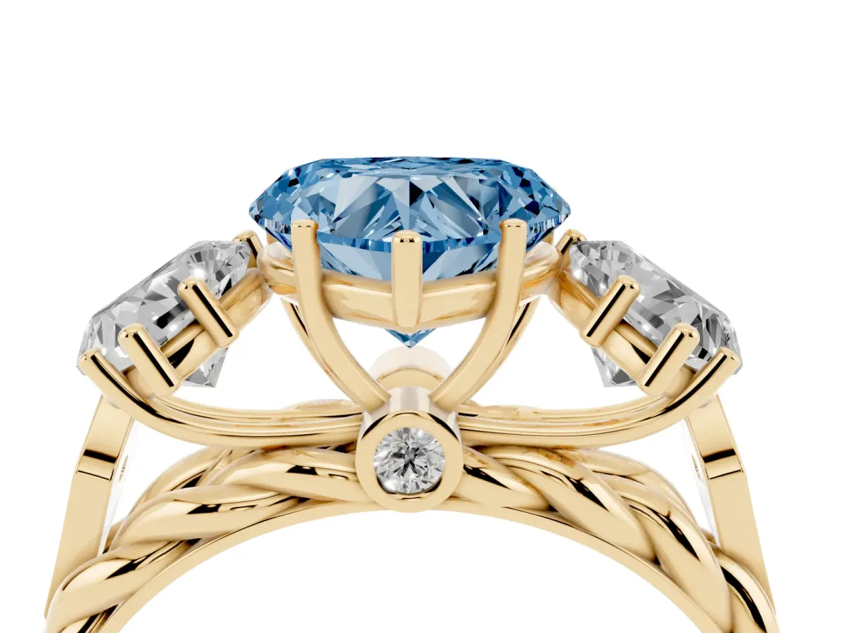 Fancy Blue Three-Stone Heart Cut Diamond Braided Band Ring with Four-Prong Setting Yellow gold