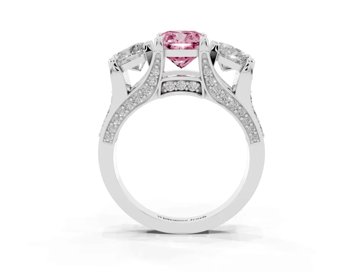 Fancy Pink Cushion Cut Diamond Three-Stone Ring with Channel Set Band and Four-Prong Setting Platinum