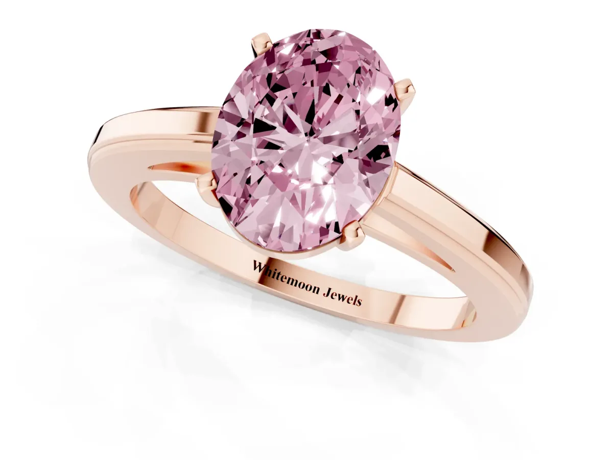 Fancy Pink Oval Cut Solitaire Diamond Ring with Four-Prong Setting and Classic Band Rose gold