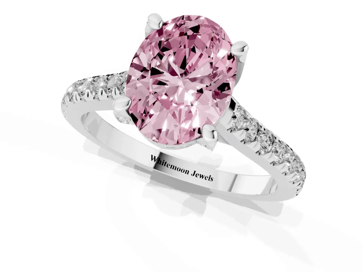 Fancy Pink Oval Cut Brilliant Diamond Solitaire with Pavé Band and Four-Prong Setting Silver