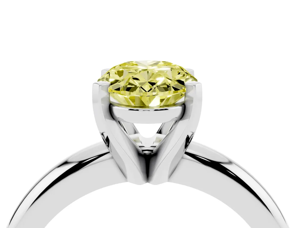 Fancy Yellow Oval Cut Diamond Solitaire Engagement Ring with Round Band and Four-Prong Setting Platinum