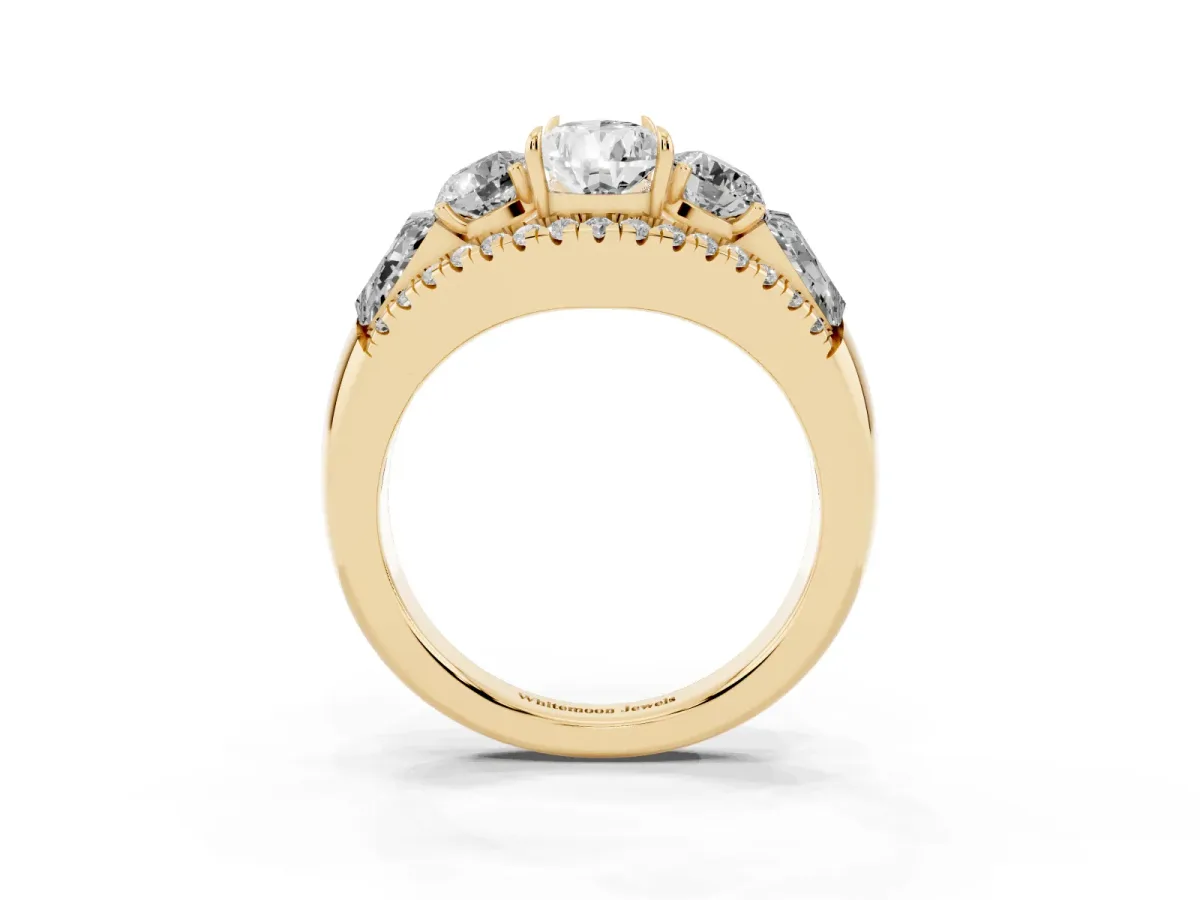 Three-Stone Pear Cut Diamond Engagement Ring with Pave Band and Prong Setting Yellow gold