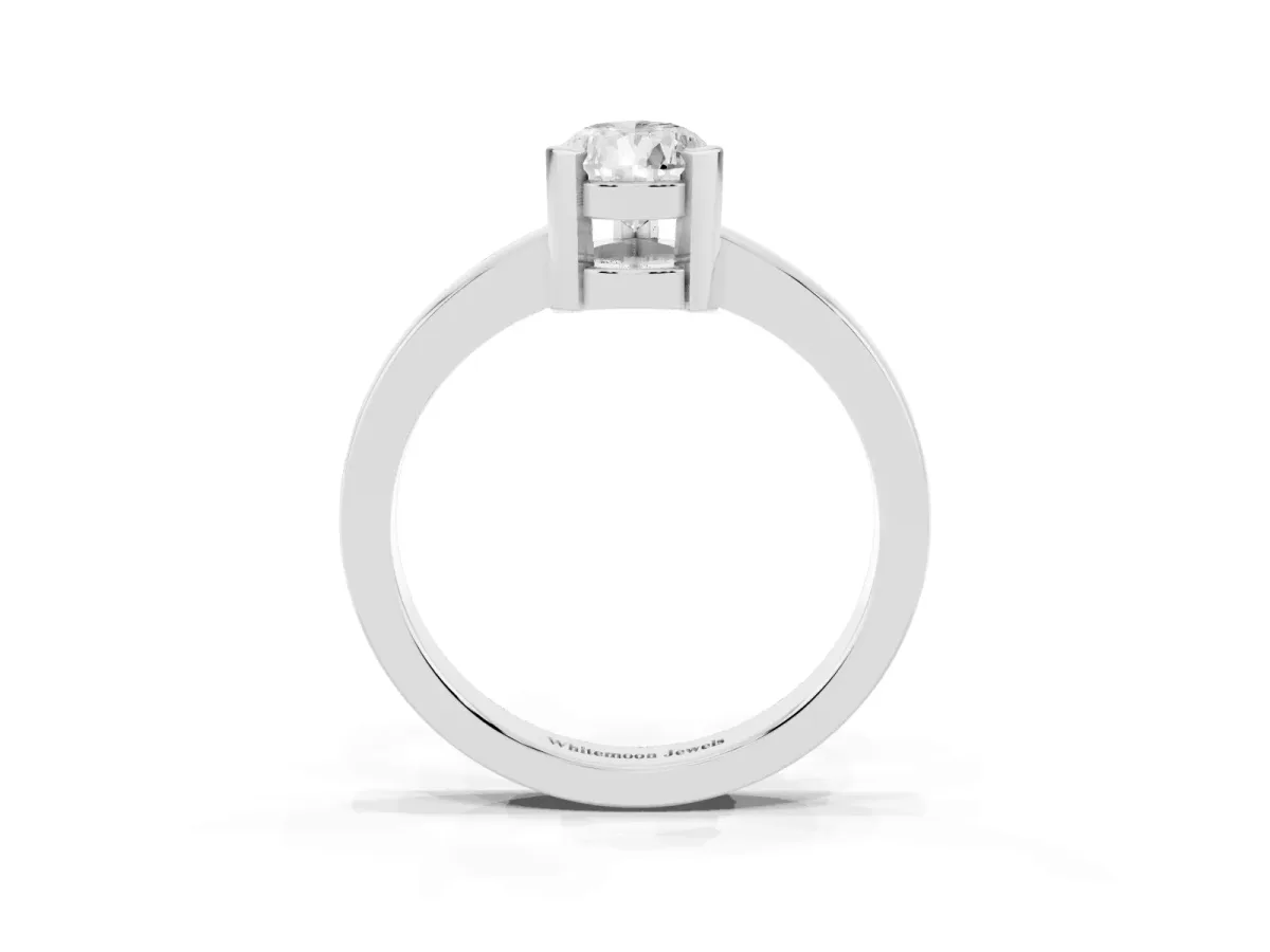 Pear Cut Cut Solitaire Ring with Four-Prong Setting and Classic Band Platinum
