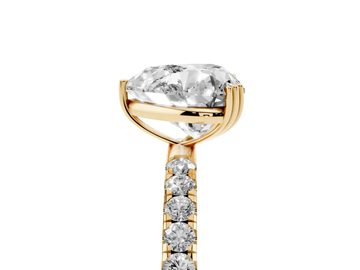 Heart Cut Brilliant Solitaire with Pavé Band and Claw Prong Setting Yellow gold