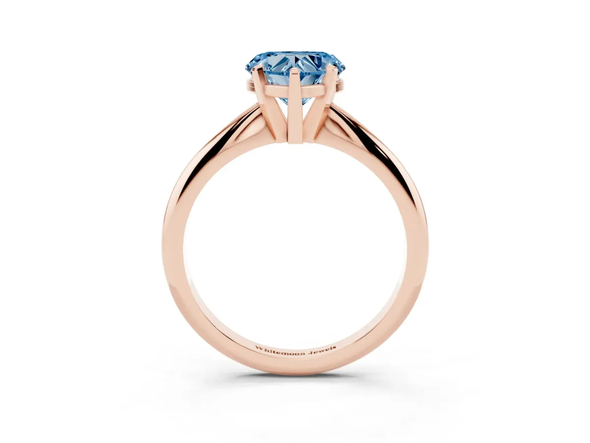 Fancy Blue Heart Cut Cut Solitaire Ring with Four-Prong Setting on a Classic Band Rose gold