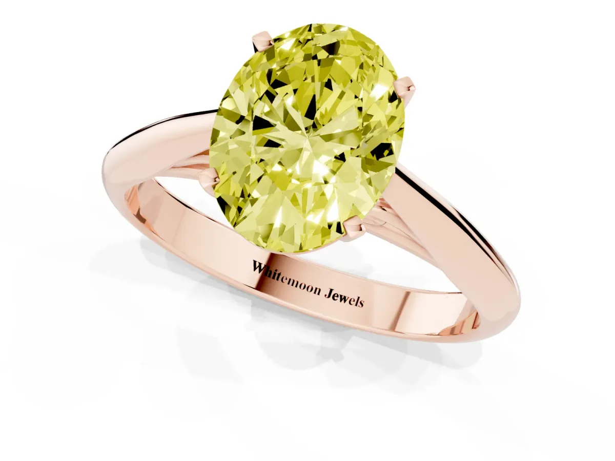 Fancy Yellow Oval Cut Diamond Solitaire Engagement Ring with Cathedral Setting and Four-Prong Mount Rose gold