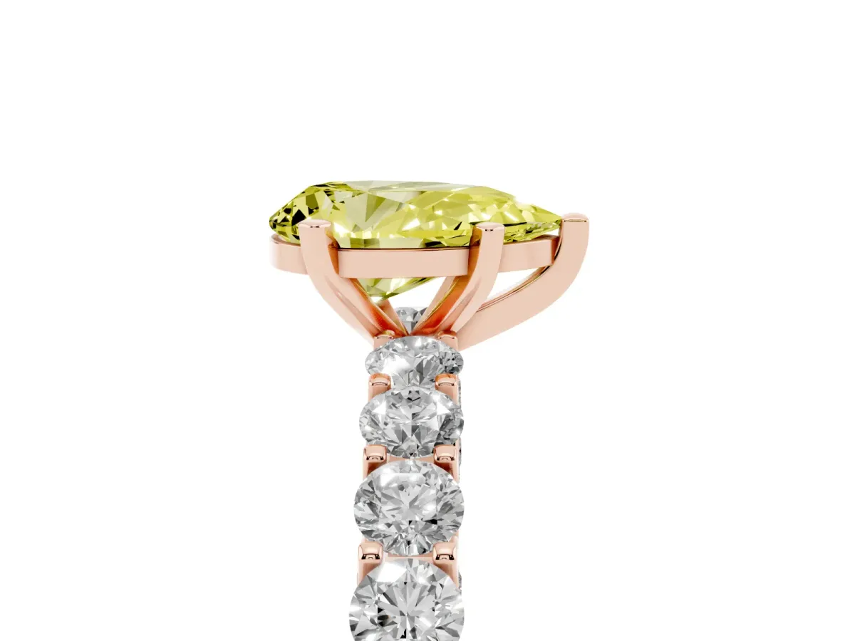 Fancy Yellow Pear Cut Diamond Solitaire Ring with Shared Prong Pavé Band and Four-Prong Setting Rose gold