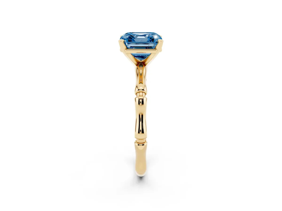 Fancy Blue Asscher Cut Solitaire Diamond Ring with Bamboo Band and Four-Prong Setting Yellow gold