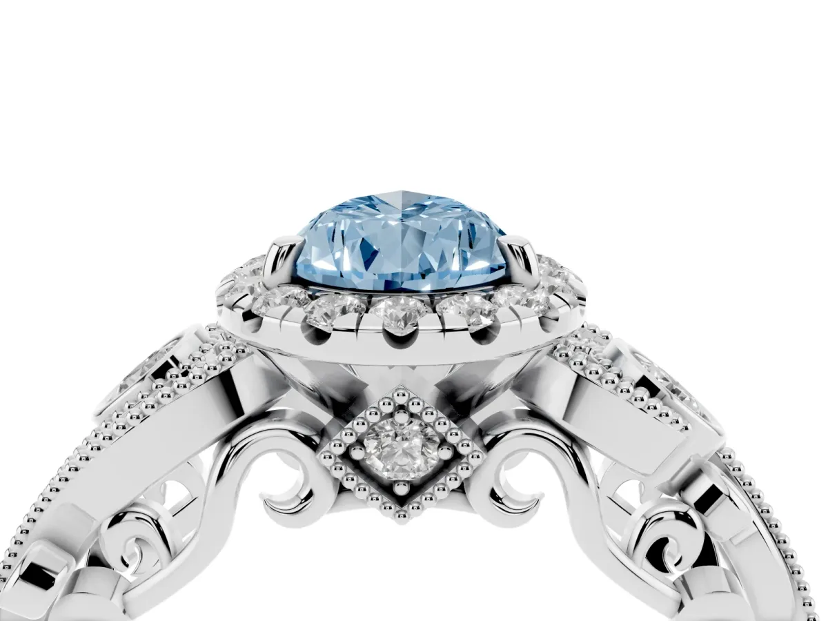Fancy Blue Pear Cut Halo Diamond Ring with Milgrain and Bezel Accents on a Split Shank Band White gold