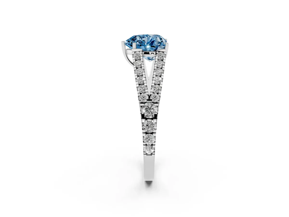 Fancy Blue Heart Cut Diamond Split Shank Engagement Ring with Round Pavé and Prong Setting Platinum