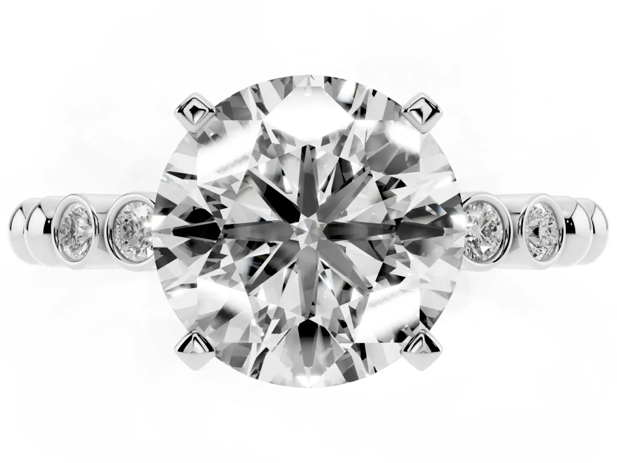 Round Cut Solitaire Bezel Accent Diamond Engagement Ring with Beaded Band and Four-Prong Setting Silver