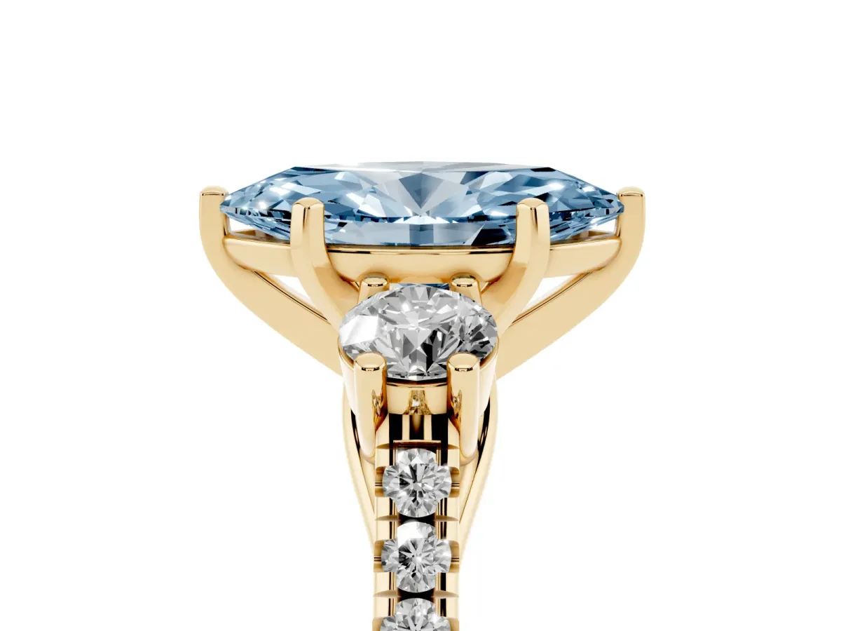 Fancy Blue Three-Stone Marquise Cut Diamond Pavé Band with Four-Prong Setting Yellow gold