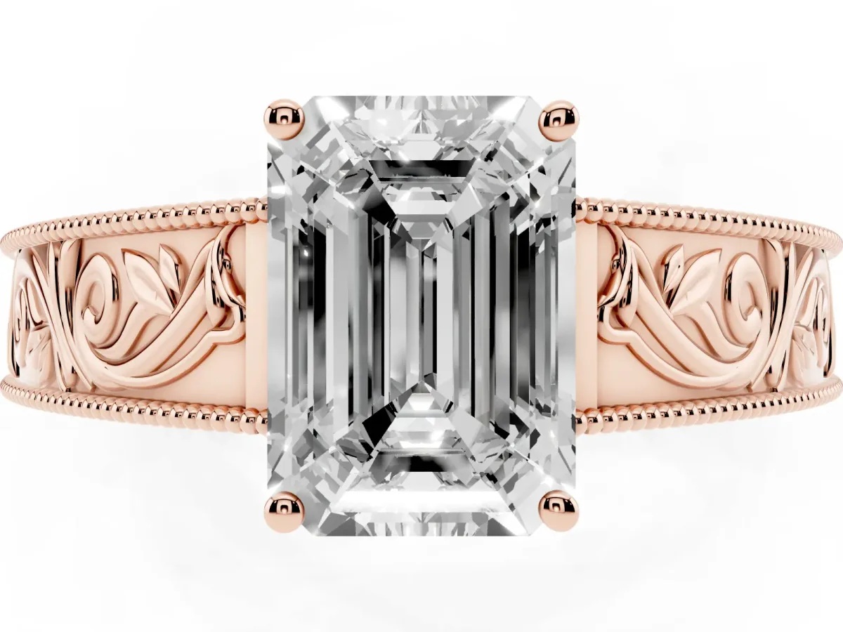 Emerald Cut Diamond Solitaire Ring with Engraved Band and Four-Prong Setting Rose gold