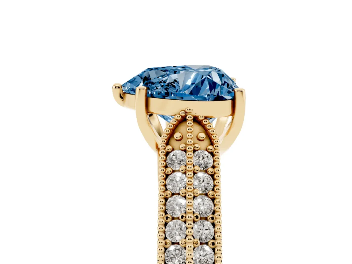 Fancy Blue Heart Cut Cut Pave Split Shank Engagement Ring with Four-Prong Setting Yellow gold