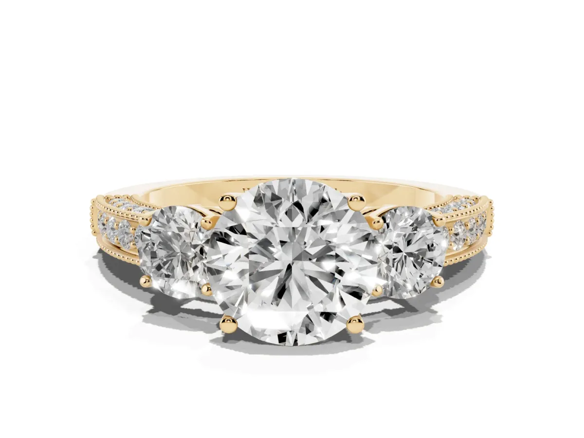 Round Cut Three-Stone Diamond Ring with Pavé Band and Four-Prong Setting Yellow gold