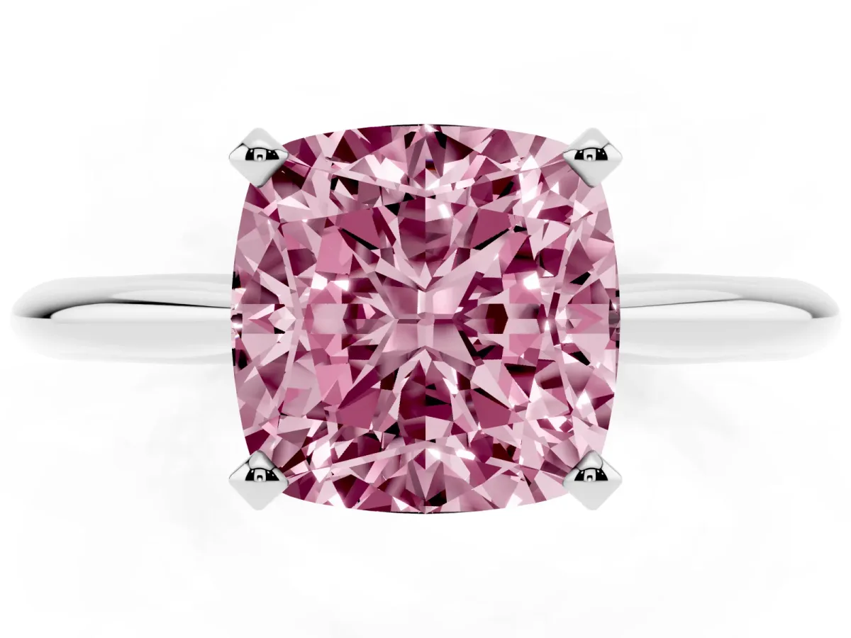 Fancy Pink Cushion Cut Cut Solitaire Ring with Four-Prong Setting on a Classic Band Silver