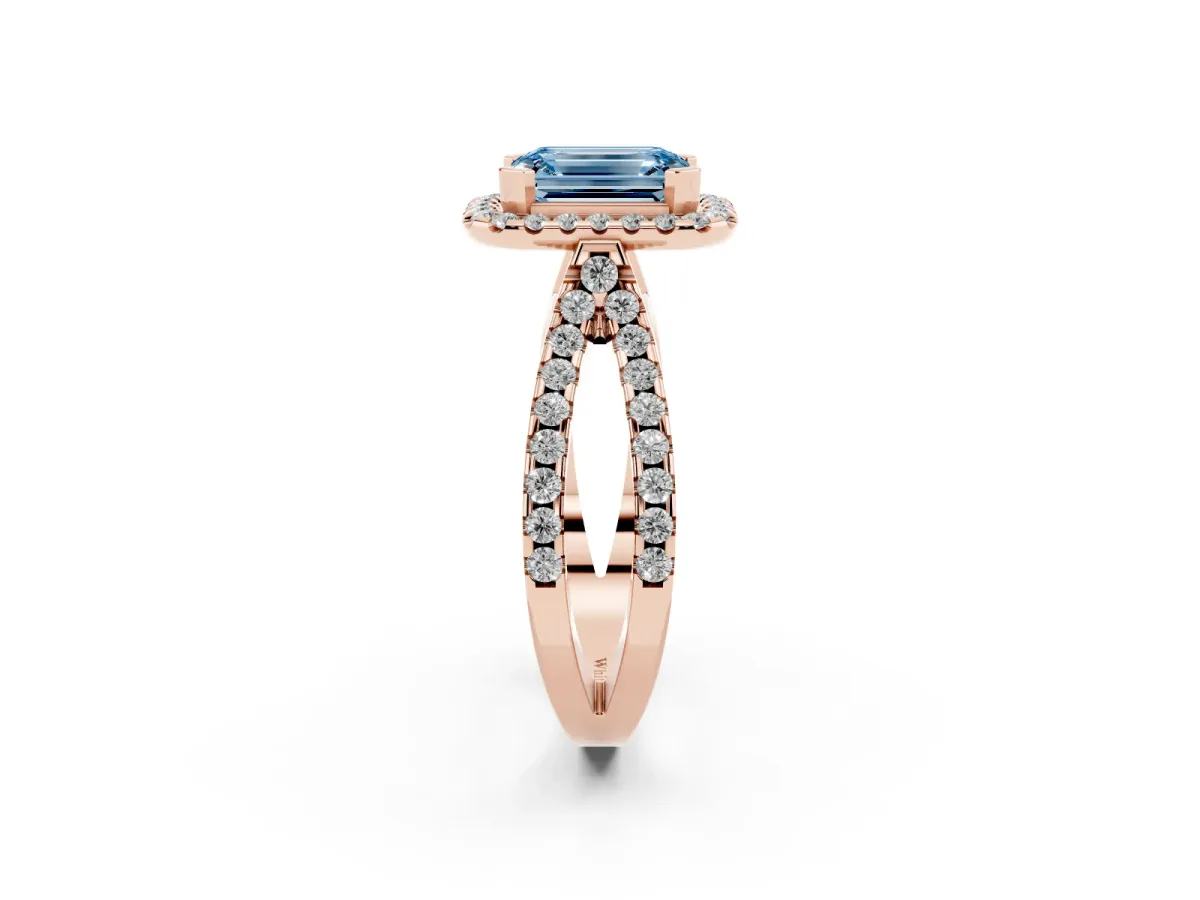 Fancy Blue Emerald Cut Diamond Halo Ring with Split Shank Pavé Band and Prong Setting Rose gold
