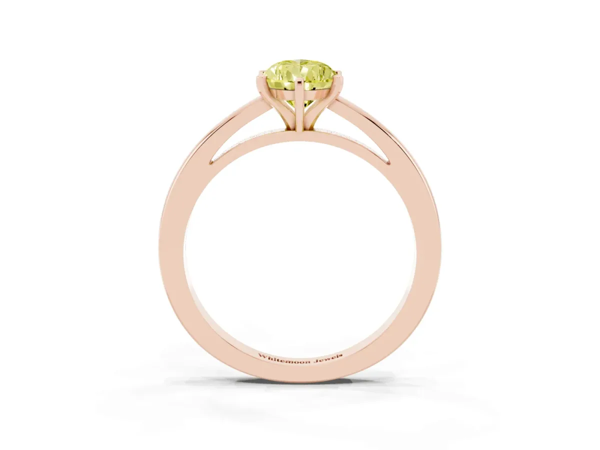 Fancy Yellow Pear Cut Solitaire Diamond Engagement Ring with Four-Prong Setting on a Classic Band Rose gold