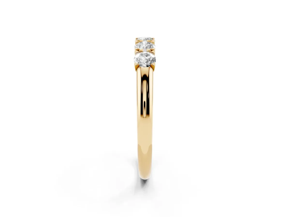 Round Diamond Channel Set Half Eternity Band with Shared Prong Setting Yellow gold