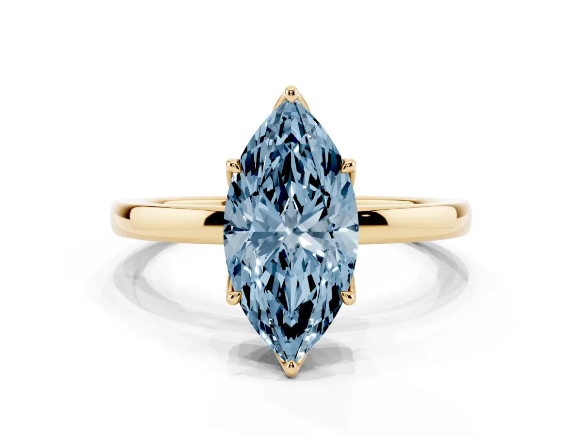 Fancy Blue Marquise Cut Diamond Solitaire Ring with Thin Band and Prong Setting Yellow gold