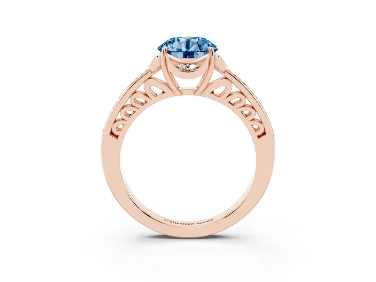 Fancy Blue Round Cut Cut Halo Diamond Ring with Channel Set Band and Four-Prong Setting Rose gold