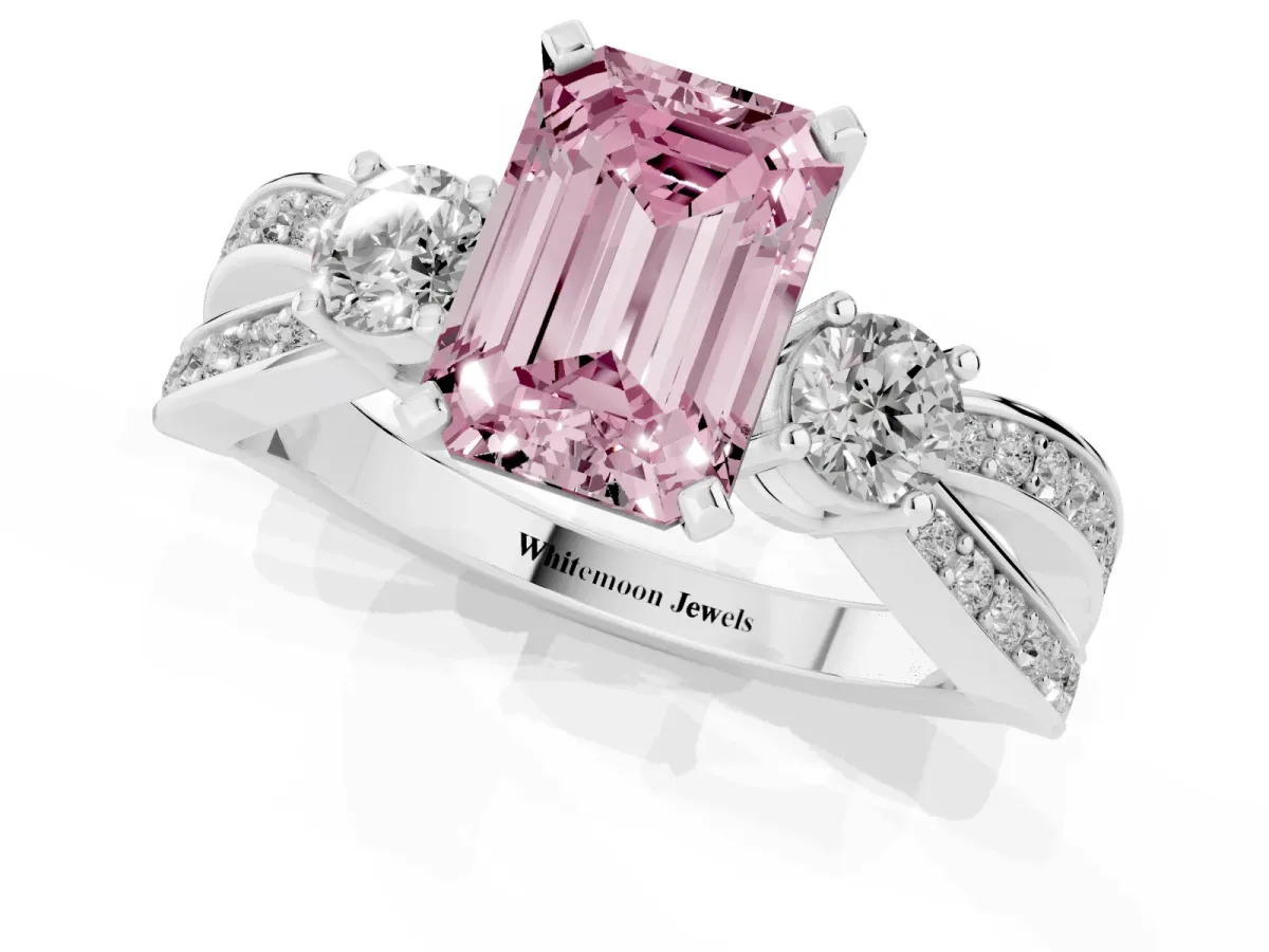 Fancy Pink Three-Stone Emerald Cut Cut Diamond Twist Band with Prong Setting Platinum