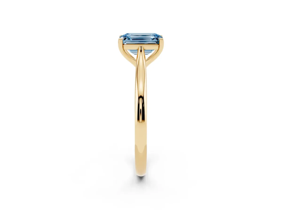 Fancy Blue Emerald Cut Cut Solitaire Ring with Cathedral Band and Four-Prong Setting Yellow gold