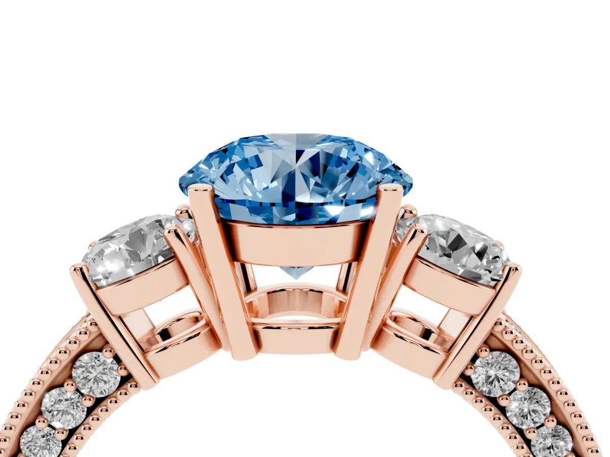 Fancy Blue Round Cut Three-Stone Diamond Ring with Pavé Band and Four-Prong Setting Rose gold