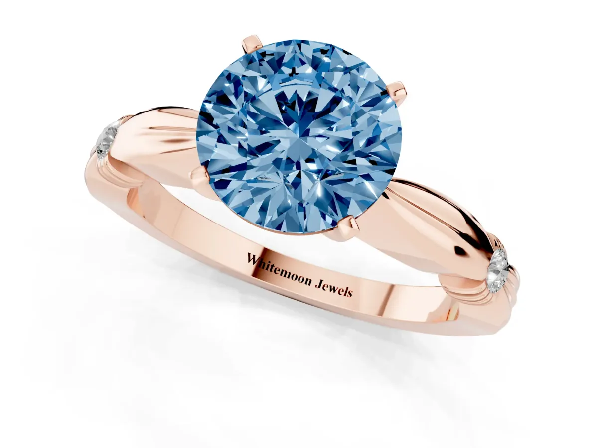 Fancy Blue Round Cut Solitaire Diamond Twisted Band with Four-Prong Setting Rose gold