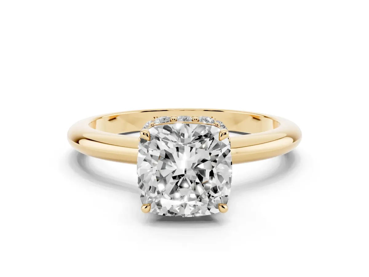 Cushion Cut Brilliant Solitaire Engagement Ring with Six-Prong Setting and Classic Band Yellow gold