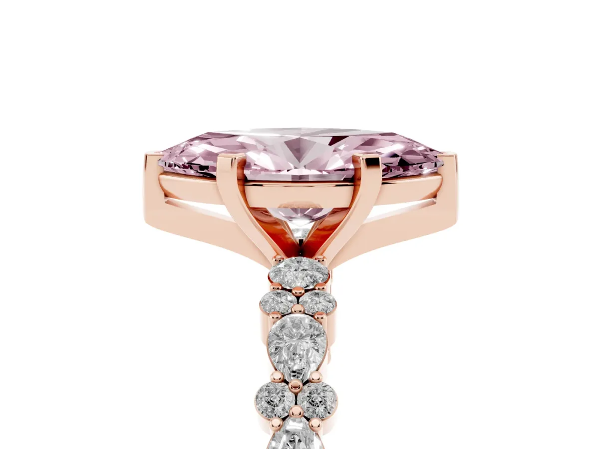 Fancy Pink Marquise Cut Diamond Side Stone Solitaire Ring with Round and Four-Prong Setting Rose gold