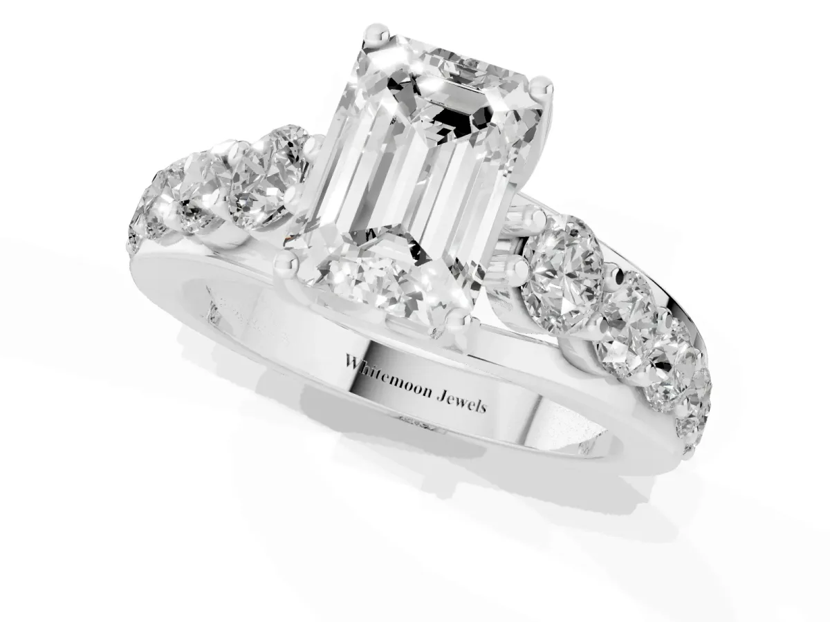 Emerald Cut Diamond Engagement Ring with Pavé Band and Four-Prong Setting Silver