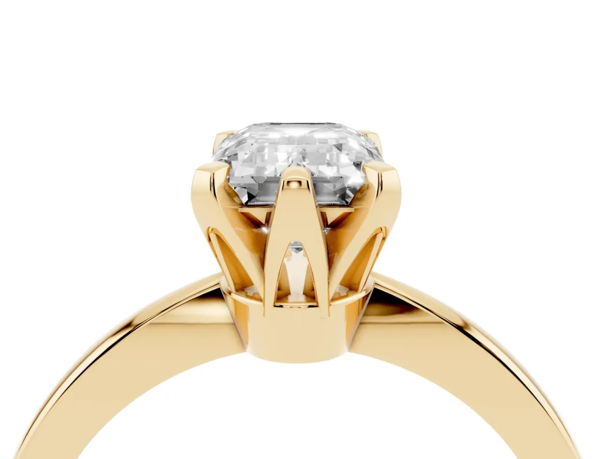 Emerald Cut Solitaire Engagement Ring with Six-Prong Setting and Tapered Band Yellow gold