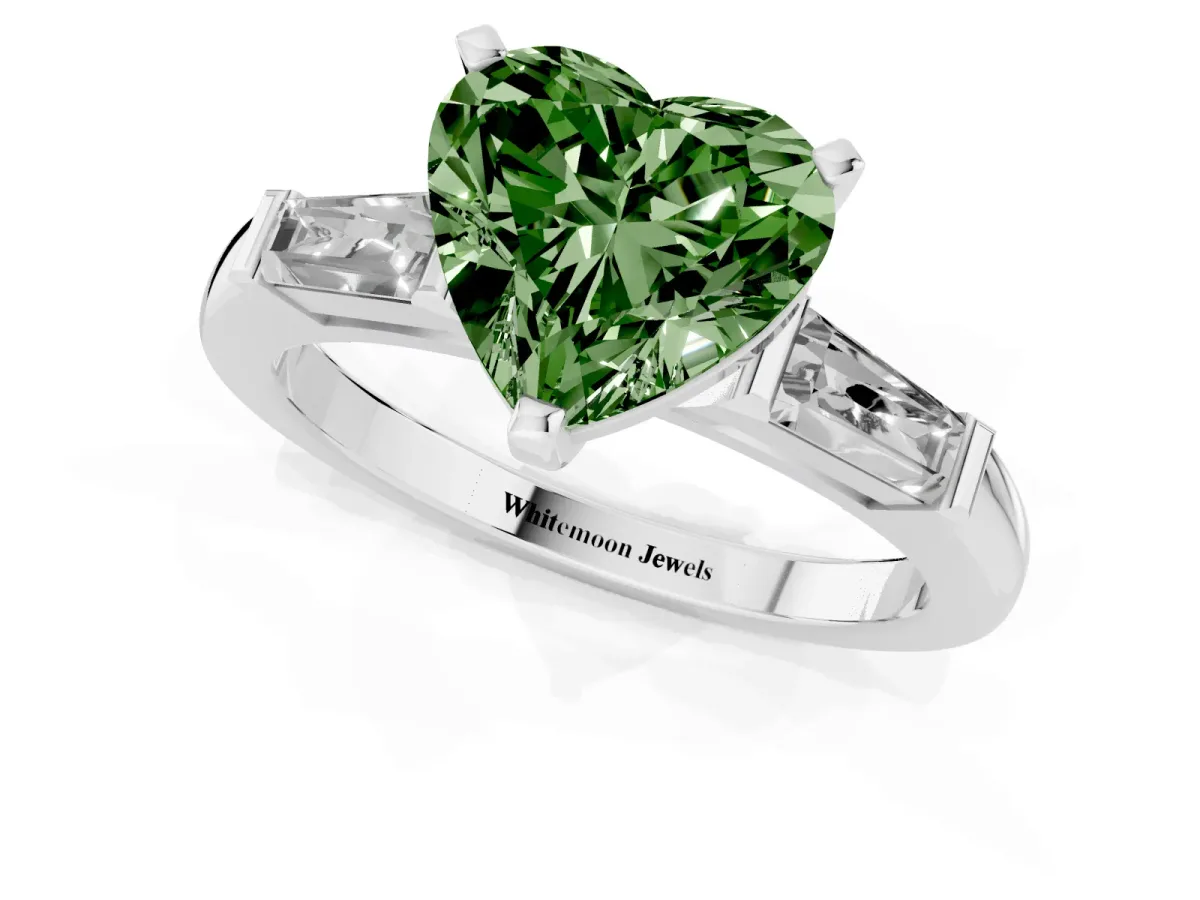 Fancy Green Heart Cut Solitaire with Tapered Baguette Side Stones on a Classic Band with Four-Prong Setting Silver