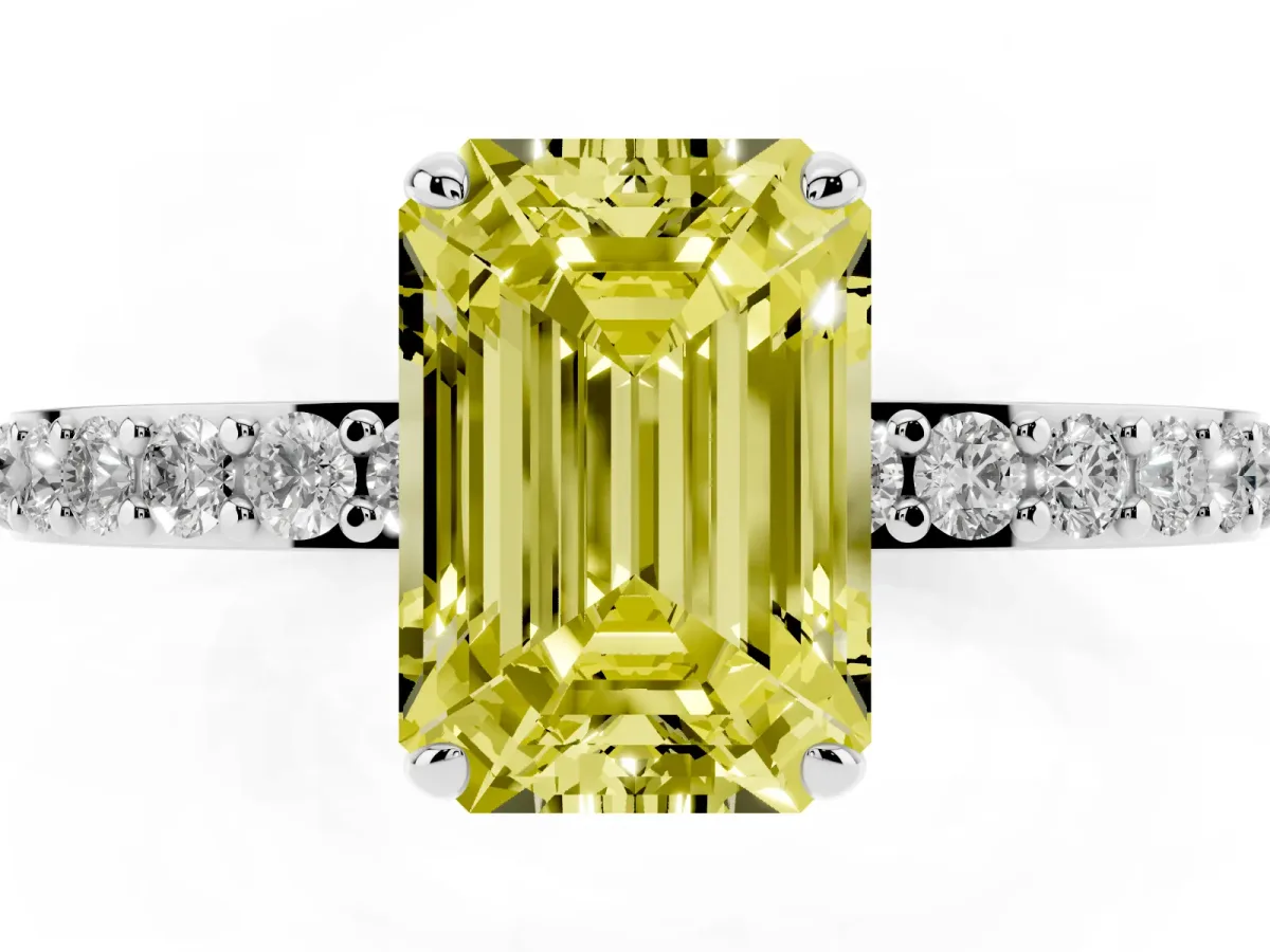Fancy Yellow Emerald Cut Diamond Pavé Engagement Ring with Round Accents and Prong Setting Platinum