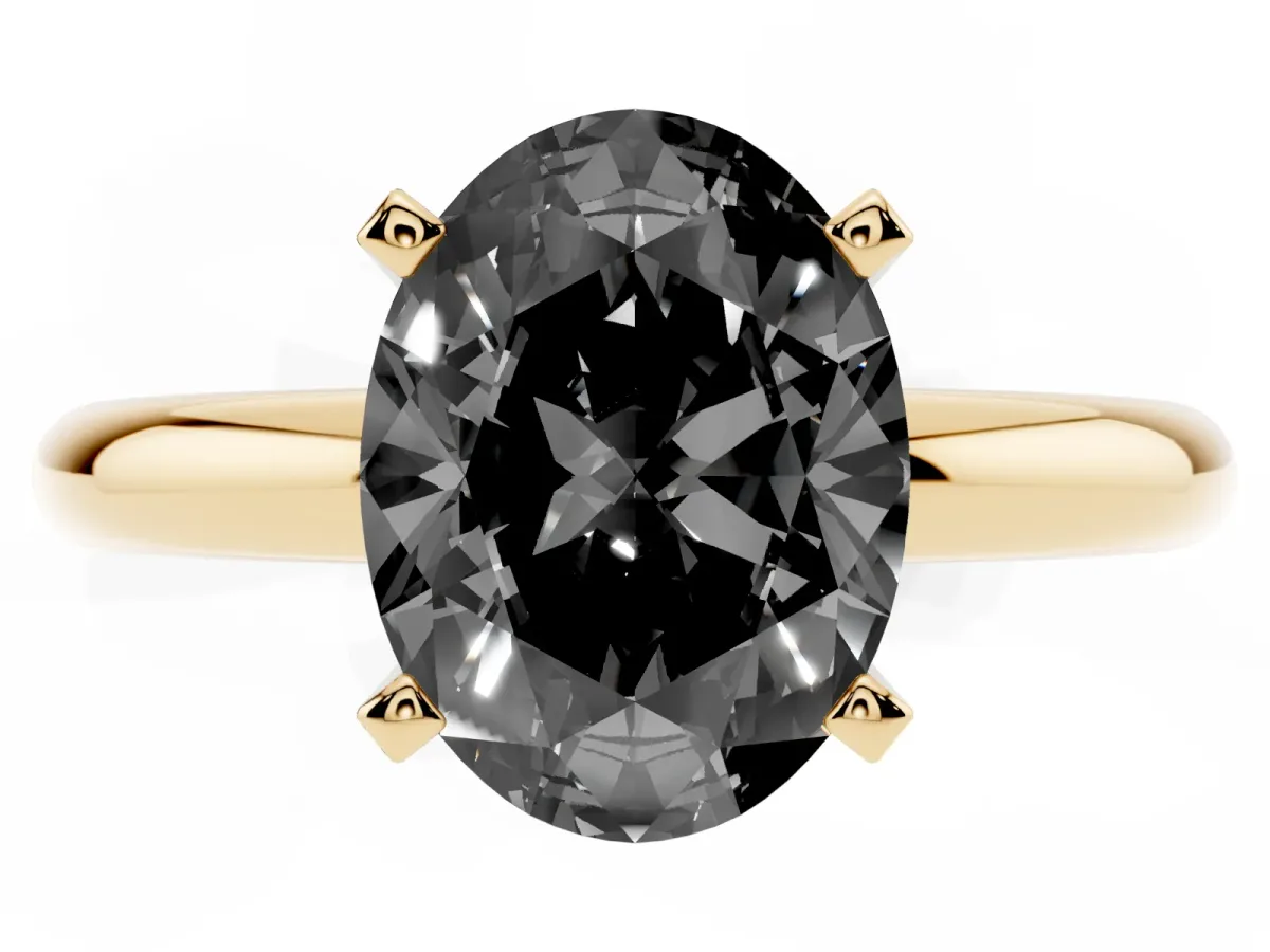 Fancy Black Oval Cut Diamond Solitaire Engagement Ring with Round Band and Four-Prong Setting Yellow gold