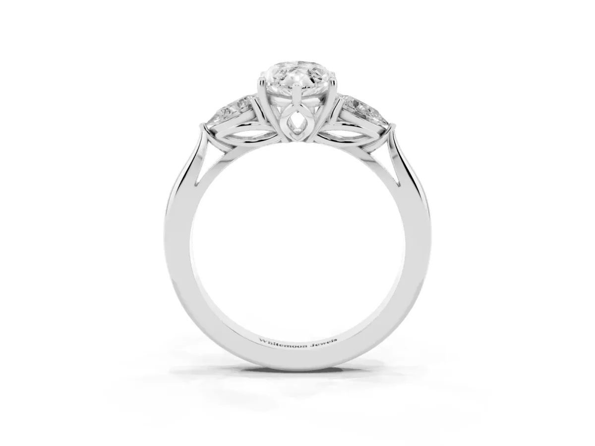 Three-Stone Marquise Cut Diamond Ring with Pear Side Stones in Four-Prong Setting Platinum