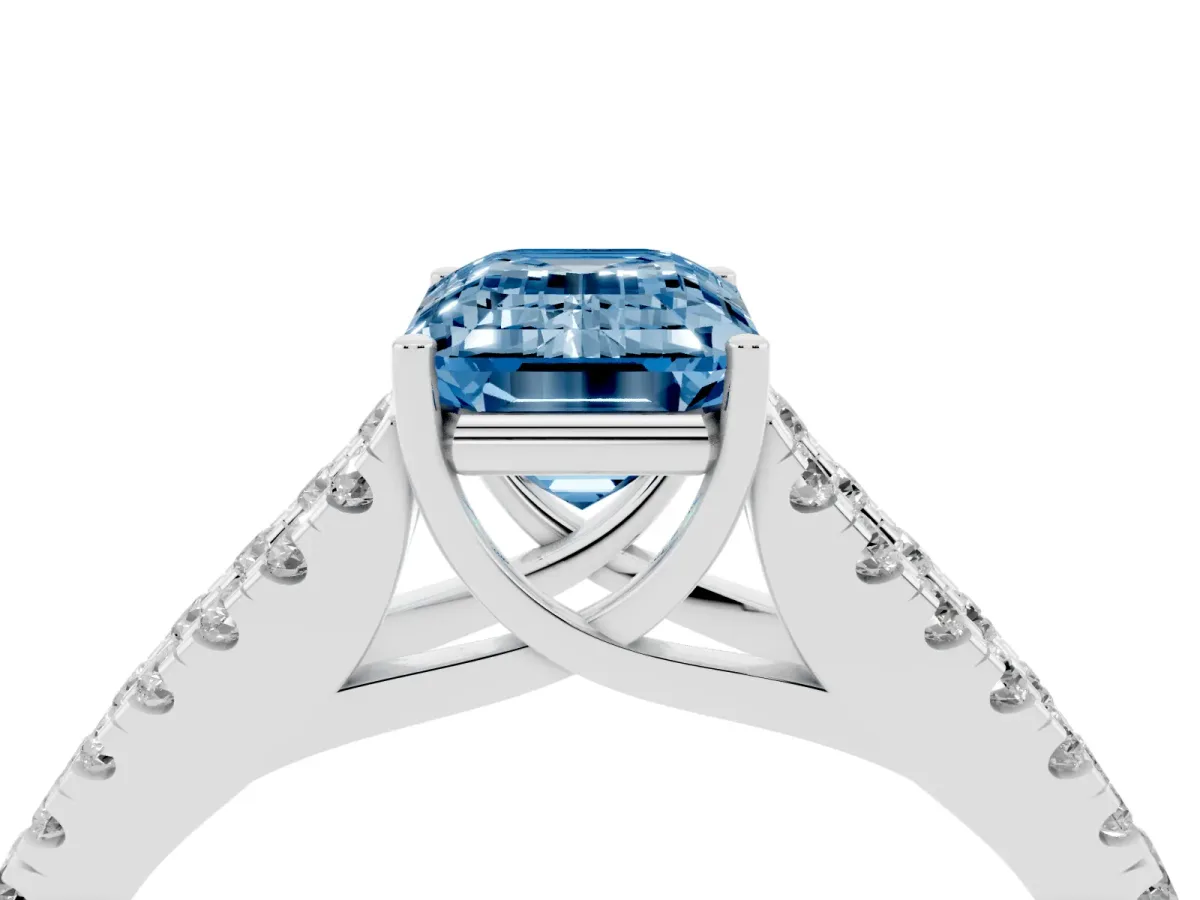 Fancy Blue Emerald Cut Diamond Split Shank Engagement Ring with Round Pavé and Prong Setting Platinum