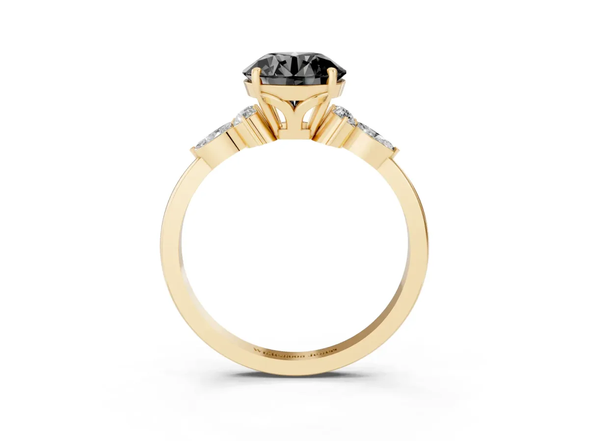 Fancy Black Round Cut Brilliant Diamond Solitaire Ring with Pear Side Stones and Four-Prong Setting Yellow gold