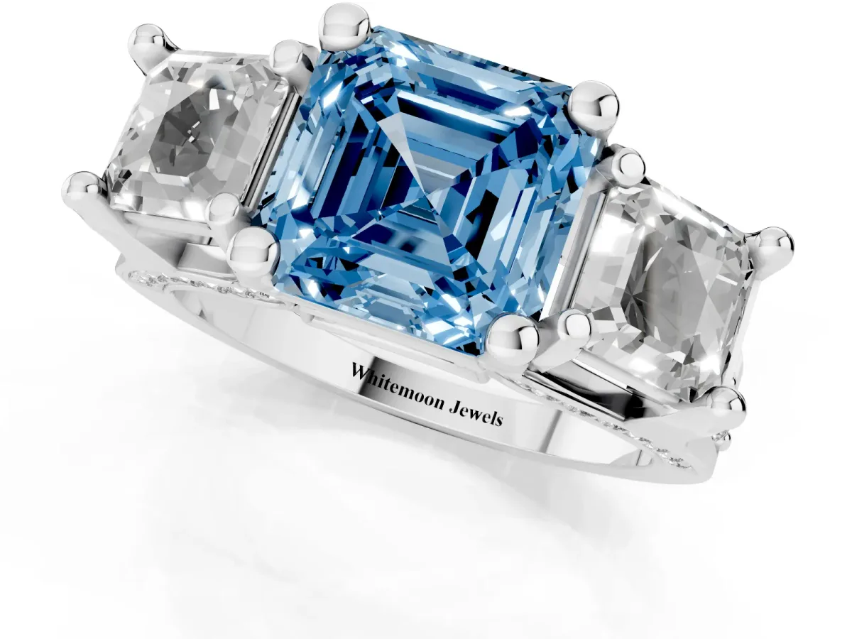Fancy Blue Asscher Cut Diamond Three-Stone Ring with Channel Set Band and Four-Prong Setting Silver